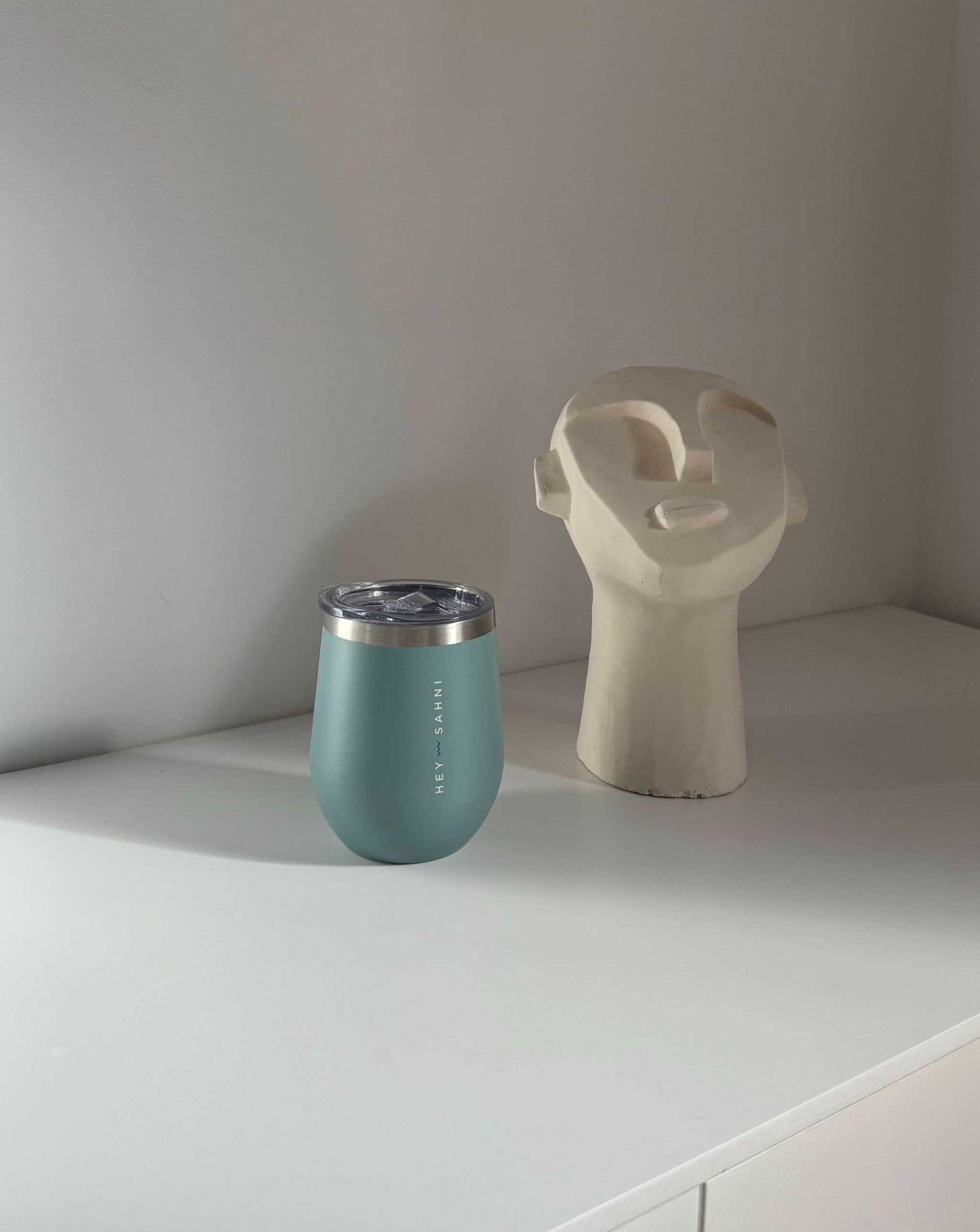 stainless steel coffee cup in pine