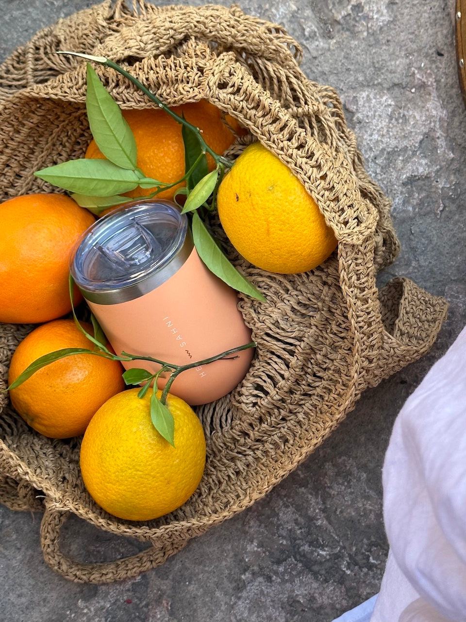 stainless steel coffee cup in orange