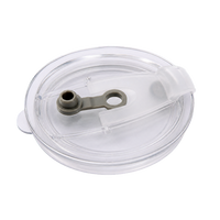 Clear plastic HEY SAHNI lid with a metal component on a white background